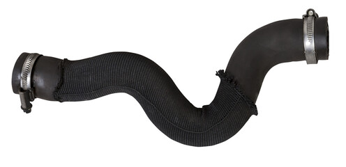 Black plastic hose of the car engine cooling system on a white isolated background in a photo...