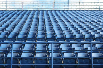 Fototapeta premium Empty blue stadium seats pattern.