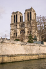 Fototapeta na wymiar Notre Dame Cathedral from the River Seine in Paris, France