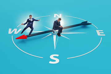 Businessman with compass looking for direction