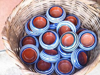 Typical portuguese ceramics in a basket