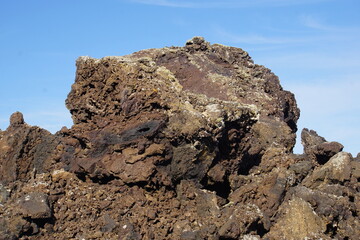 Different shapes of volcanic lava which solidified on Lanzarote Island 200 years ago, rocks, lava, photographed in November 2022, lava chimney, lava tunnel