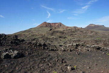 Different shapes of volcanic lava which solidified on Lanzarote Island 200 years ago, rocks, lava, photographed in November 2022, lava chimney, lava tunnel