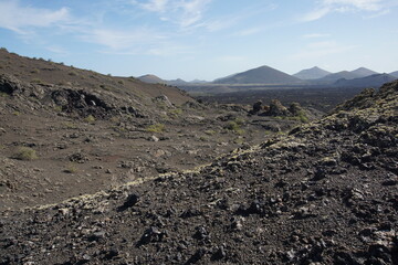 Different shapes of volcanic lava which solidified on Lanzarote Island 200 years ago, rocks, lava, photographed in November 2022, lava chimney, lava tunnel