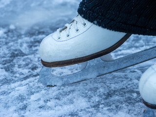ice skates in the snow