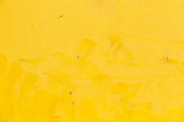 pattern of old yellow painted wall