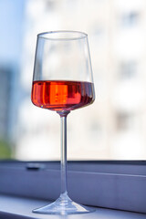 Rose wine in a glass, close up