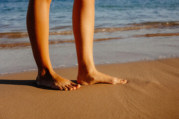 feet on the beach