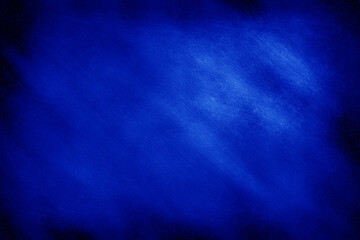 Abstract blue colored blackboard textured grunge background