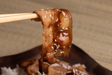 Chopsticks, sliced pork, Japanese sauce
