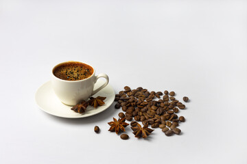 Coffee cup and coffee beans on a pink background