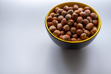 Hazelnut. A bowl of hazelnut, nut. 