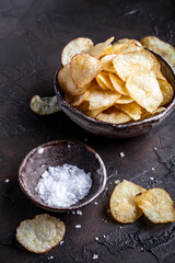 Crispy potato chips with salt - 554470793