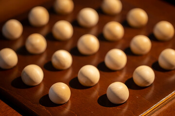 Fototapeta na wymiar Wooden balls from an old board game.