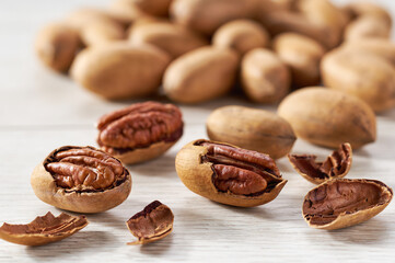 Pecan on a white kitchen table, selective focus.