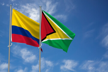 Republic of Colombia and Co-operative Republic of Guyana Flags Over Blue Sky Background. 3D Illustration