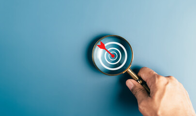 Magnifier glass focus to target icon which for planning development leadership and customer target...