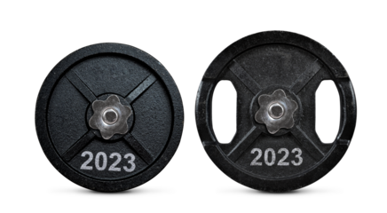 2023 written on the metal disc of dumbbells isolated on transparent background, PNG. Resolutions for the New Year.