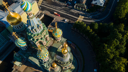 Aerial view of a dome of the Savior on Spilled Blood in the historical and at same time modern city of St. Petersburg at sunny summer dawn