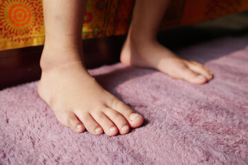 5 year old child girl feet close up