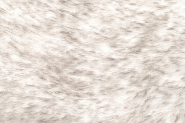 White wolf fake fur, surface, close-up, from above. Faux fur made of synthetic fibers. Pile of fabric and animal-friendly alternative to traditional fur clothing, with same appearance and warmth.
