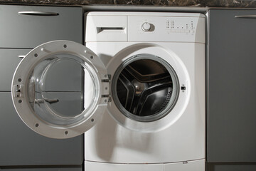 White washing machine at home.