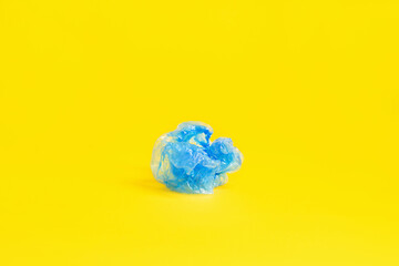 blue  shoe covers on yellow background
