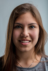 Fototapeta premium beautiful girl listens with a happy smile
