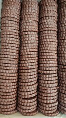 Chocolate chip cookies in rows stacked 