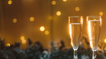 Sparkling Champagne goblets in the night