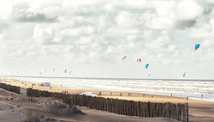 Kite surfing at Zandvoort aan Zee in the Netherlands - obrazy, fototapety, plakaty