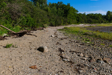 Sand and rock beach on the coast of Maine in the summertime.