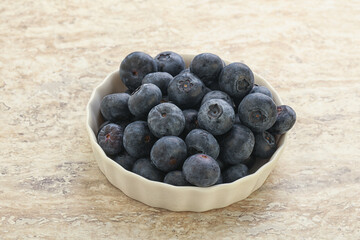 Sweet ripe blueberry heap in the bowl