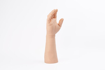 Arms for Medicine, tatto Silicone arm Fake arm Prototype Fake hand White skin Fake skin White background Plastic arm For training Close