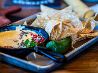 Que so with meat and veggies and chips