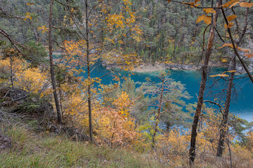 On trail in autumn around Lac Pont Baldy in Briancon, Hautes-Alpes, France