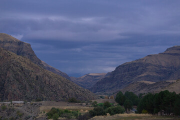 Naklejka premium mountain and river view, dramatic sky