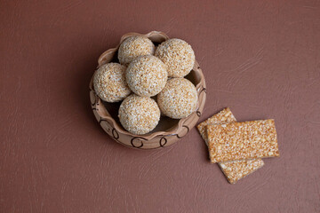 The indian sesame sweet or tilgul laddu, made up of jaggery and sesame seeds, indian sweet for...