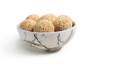 Indian sweet for traditional festival makar sankranti Rajgira laddu made from Amaranth seed in Bowl on white background