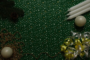 Christmas decorations on a green background with stars