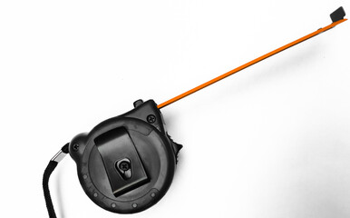 Measuring tape isolated on white background, tape measure, top view. Copy space