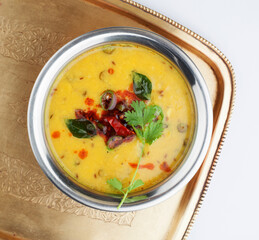 Indian popular food Dal Tadka Curry served with roti flatbread 