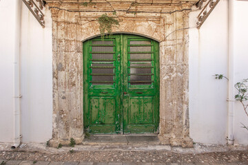Old green door in Nocisia, cyprus