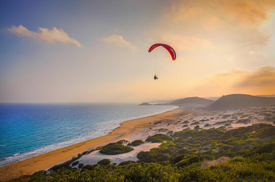 A paragliding sunset time at golden beach, Karpaz, Cyprus