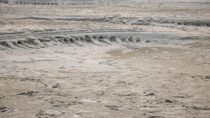 Texture made of send. The river has receded and covered the sand.
