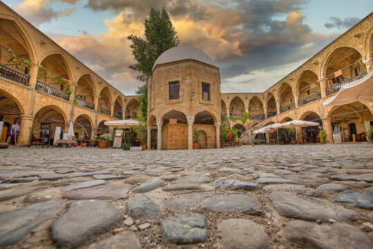 Historical The Great Inn, Nicosia, North Cyprus. Ancient Ottoman architecture. Antique arch building.