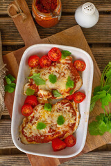 Baked chicken breasts with Sicilian pesto and cheese