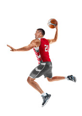 Basketball player in a jump. Basketball player in motion and action. Sport energy. Sport emotion. Isolated