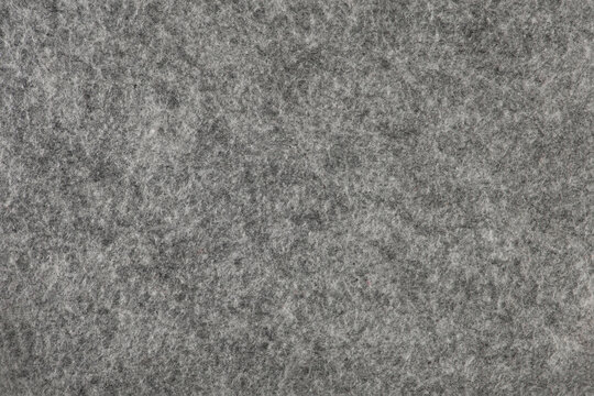 Felt texture. Texture of gray felt. Abstract background with natural gray felt. High resolution texture photo