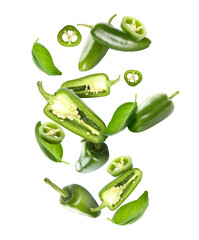 Flying green jalapeno peppers and fresh basil leaves on white background - obrazy, fototapety, plakaty